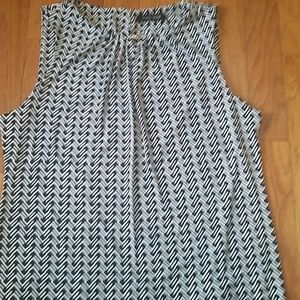 Blue and white sleeveless blouse